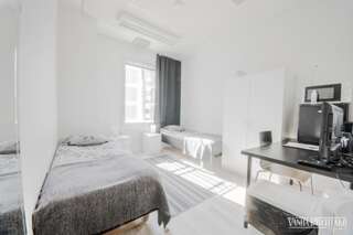 Хостелы Vanha Postitalo Варкаус Двухместный номер с 1 кроватью или 2 отдельными кроватями, общая ванная комната-5